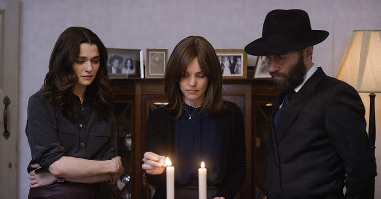 Ronit (Rachel Weisz) with Esti (Rachel McAdam) and her husband David (Alessandro Nivola). Image courtesy of Curzon Artificial Eye Ronit (Rachel Weisz) with Esti (Rachel McAdam) and her husband David (Alessandro Nivola). Image courtesy of Curzon Artificial Eye