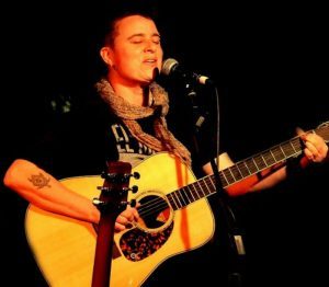 Australian Songwriter And Composer Christina Green with Guitar singing Australian Songwriter And Composer Christina Green with Guitar singing